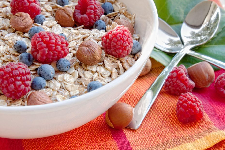 10356058 - oat nuts with fresh blueberries and raspberries and hazelnuts